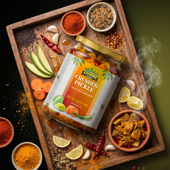 Kashmir Delights crushed pickle in mustard oil in a glass jar with visible crushed vegetables and mustard seeds, ready to serve.