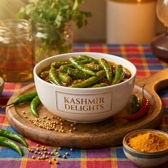 Kashmir Delights Green Chili Pickle in Mustard Oil jar with vibrant green chilies and mustard seeds visible inside.